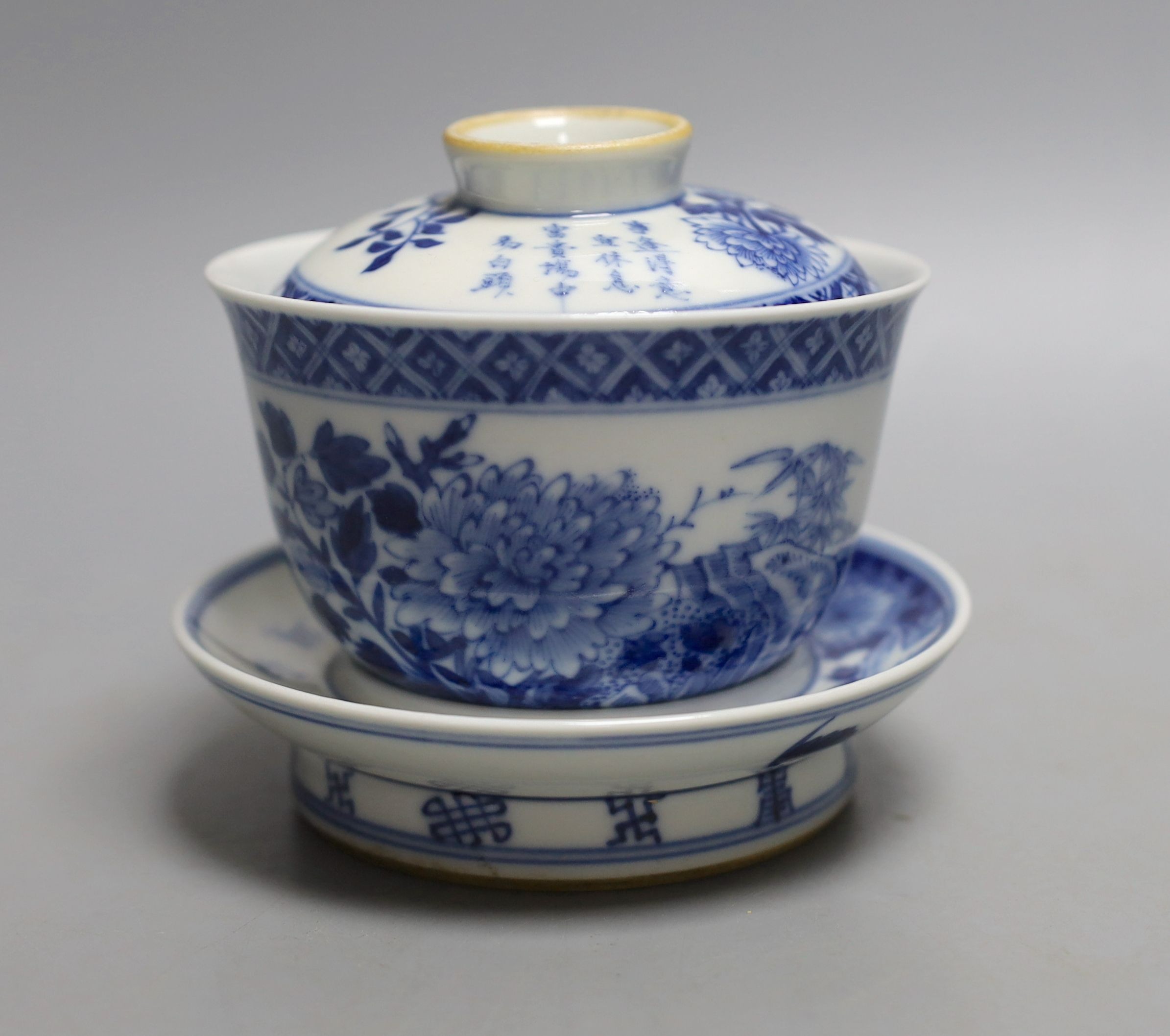 A Chinese blue and white tea bowl, stand and cover - altogether 10cm tall